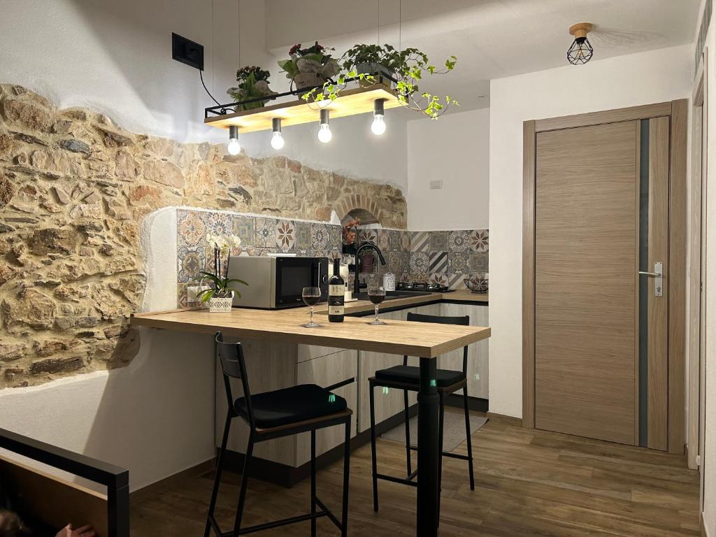 Telewizja i/lub zestaw kina domowego w obiekcie Tesori di Sardegna