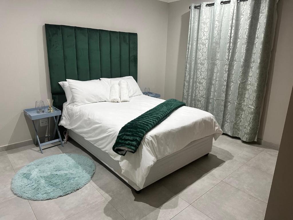 Cama o camas de una habitación en Nyeza homes