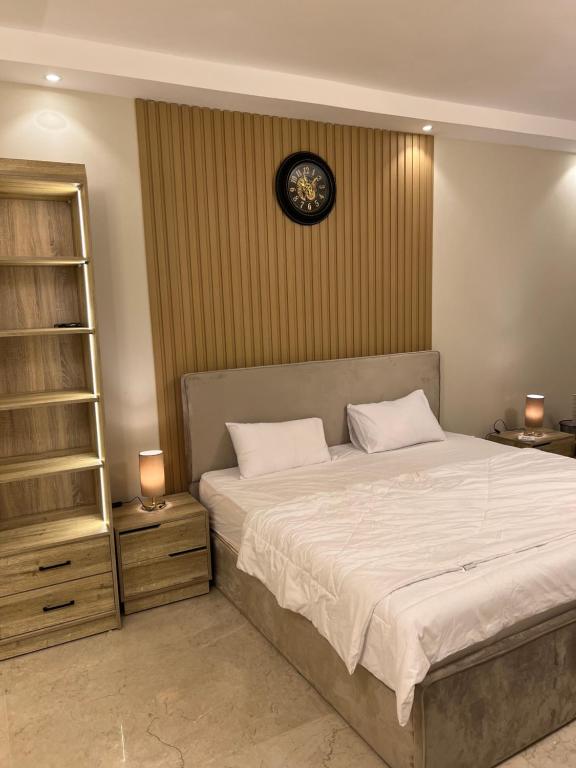 Postel nebo postele na pokoji v ubytování Cozy Royal Rooms in new cairo