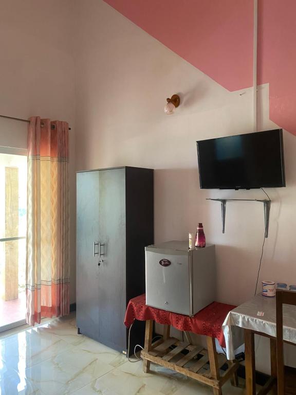 TV a/nebo společenská místnost v ubytování Island Breeze Inn