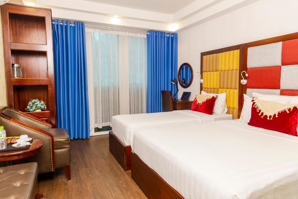 Postel nebo postele na pokoji v ubytování Hanoi City Backpackers Hostel