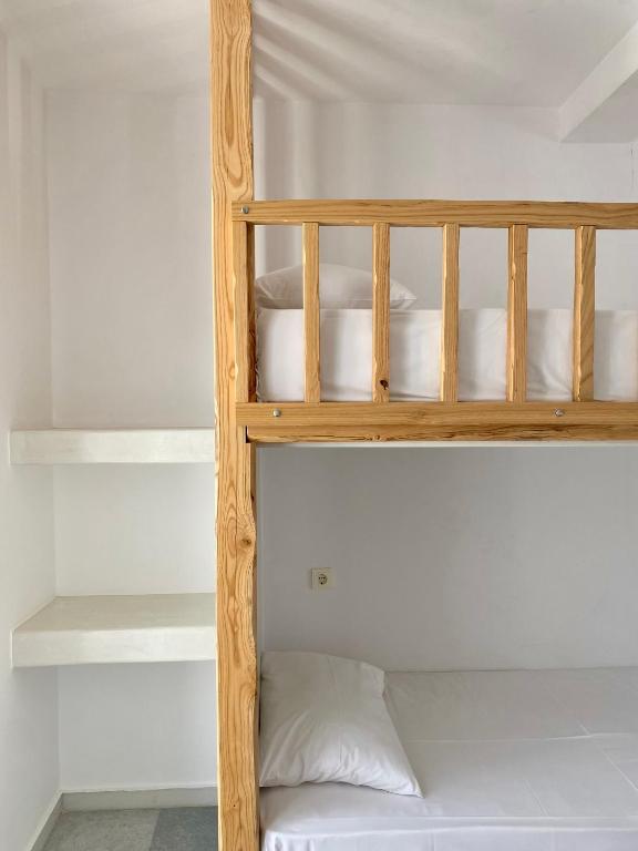 Postel nebo postele na pokoji v ubytování Fikas Hotel