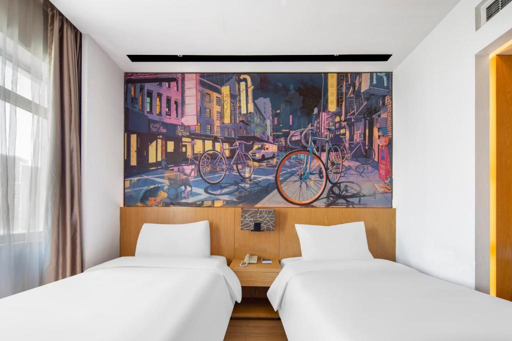 Postel nebo postele na pokoji v ubytování Minimax Hotel Shanghai Songjiang