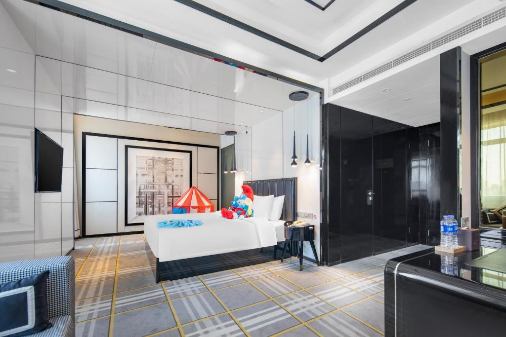 Postel nebo postele na pokoji v ubytování Minimax Hotel Shanghai Songjiang