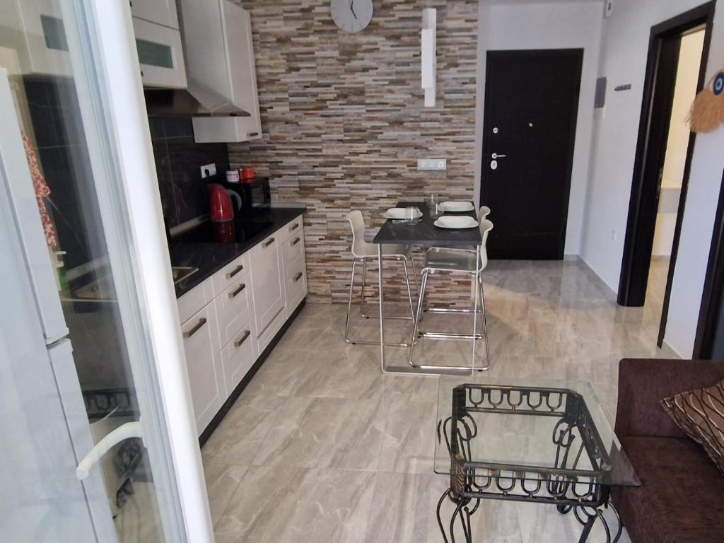 Kuchyň nebo kuchyňský kout v ubytování Christakis Luxury Apartment