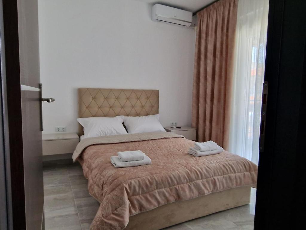 Postel nebo postele na pokoji v ubytování Christakis Luxury Apartment