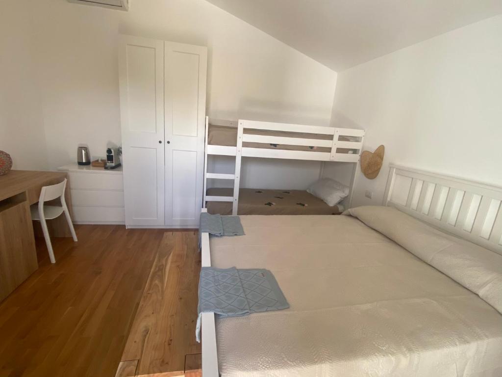 Postel nebo postele na pokoji v ubytování APulia casa e cucina