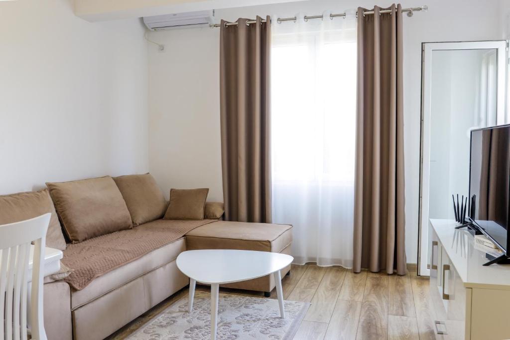 A seating area at Trea Apartment