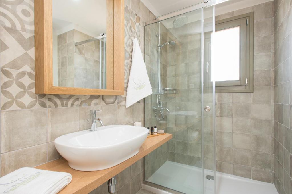 Kúpeľňa v ubytovaní Callisto Seaside Homes & Suites