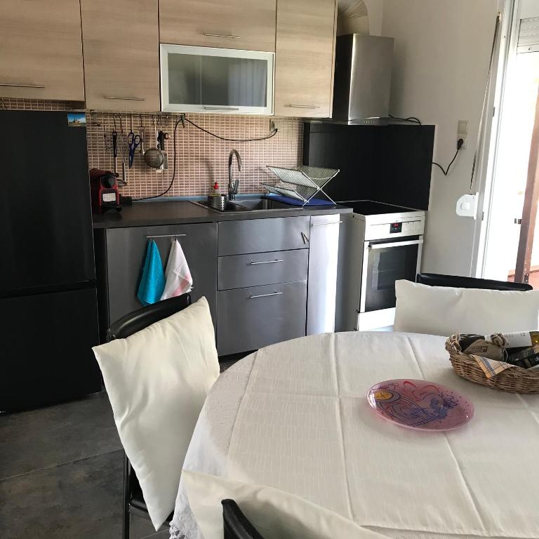 Kuchyň nebo kuchyňský kout v ubytování Apartment Michail