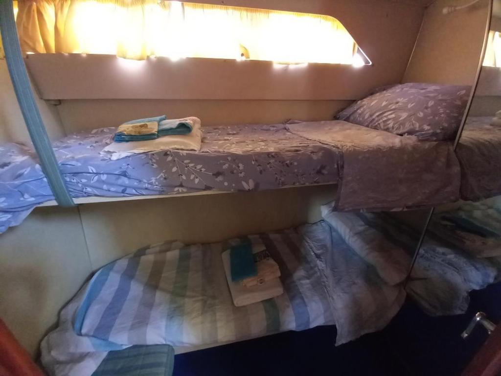 Postel nebo postele na pokoji v ubytování Barca Deliziosa