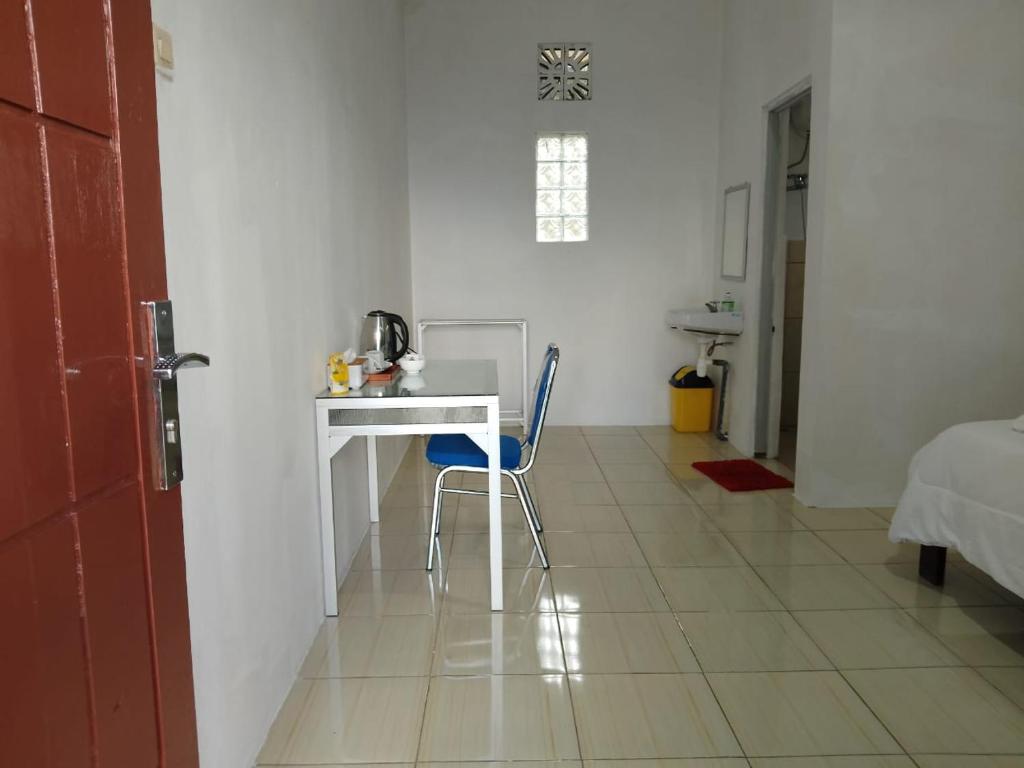 Postel nebo postele na pokoji v ubytování Sao Ria Wisata Lodge