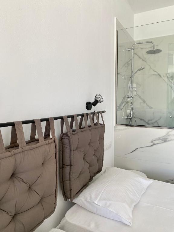 Postel nebo postele na pokoji v ubytování Fikas Hotel