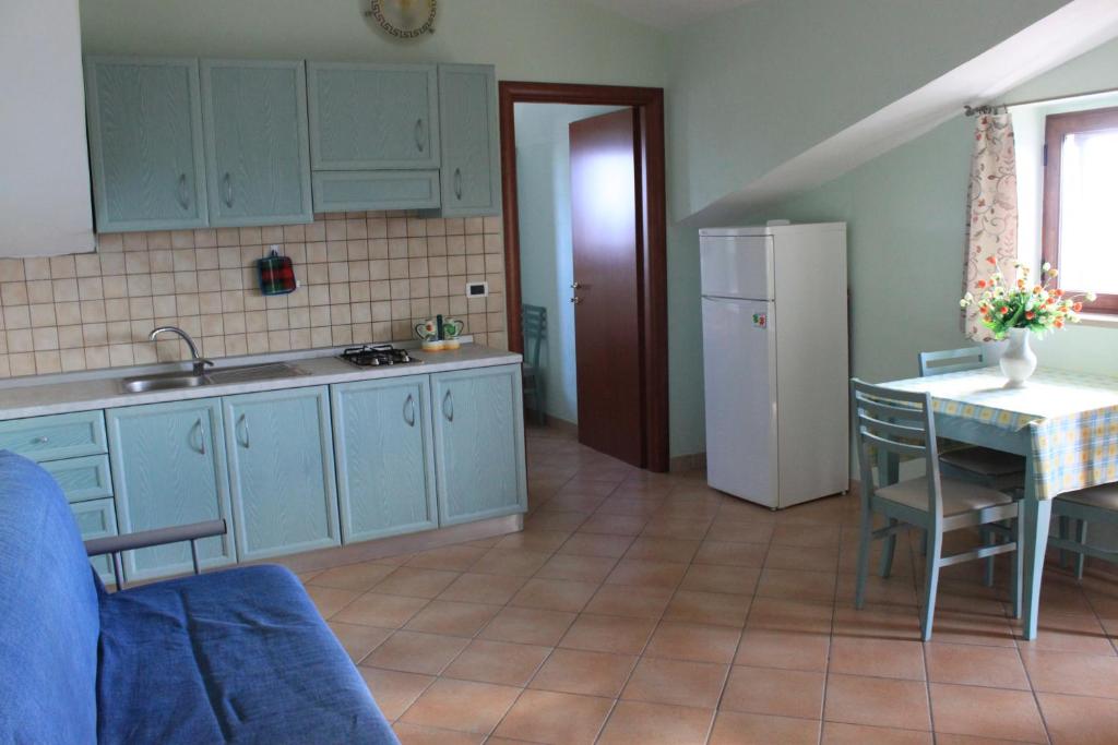 Kuchnia lub aneks kuchenny w obiekcie Green Park Residence