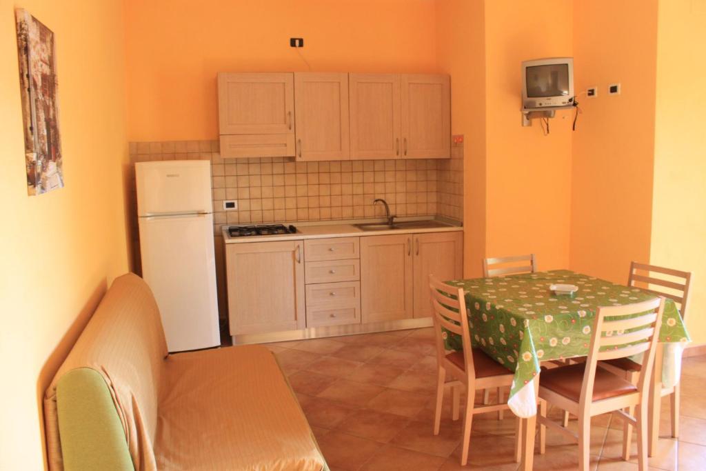 Kuchnia lub aneks kuchenny w obiekcie Green Park Residence