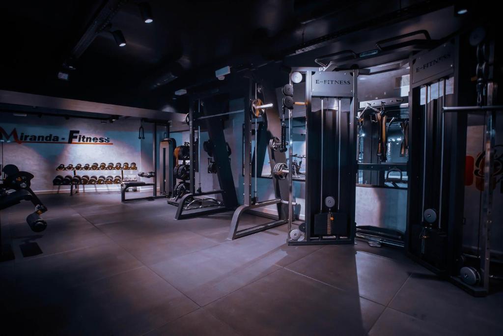 a gym with several equipment in a room at MIRANDA HOTEL - Tanger in Tangier