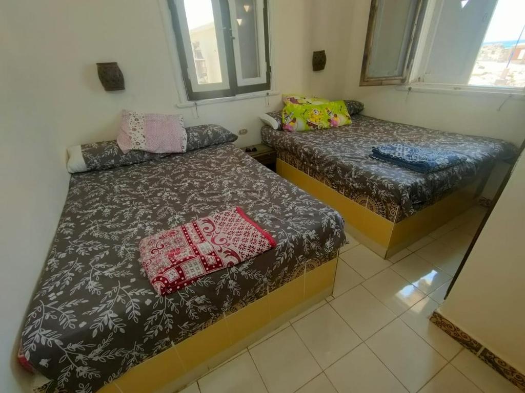 Postel nebo postele na pokoji v ubytování Private Villa in Agiba Beach