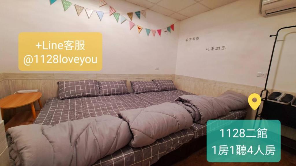 Postel nebo postele na pokoji v ubytování 員林過夜1128秘密基地