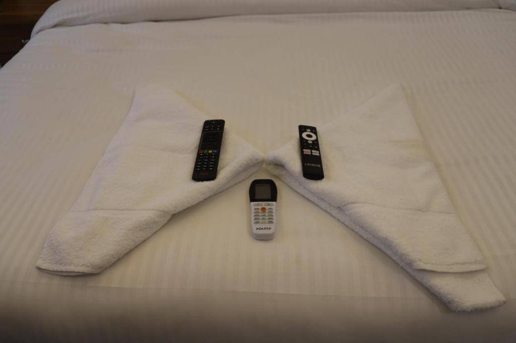 Postel nebo postele na pokoji v ubytování Opulent Inn by Lime Tree Hotels
