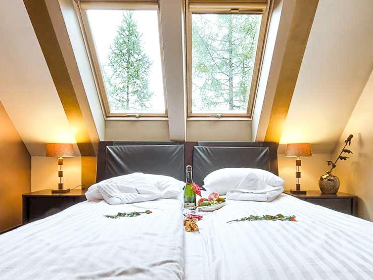 Posteľ alebo postele v izbe v ubytovaní VisitZakopane - Mango Apartment