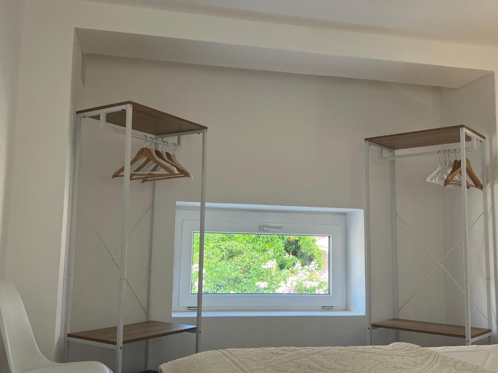 Postel nebo postele na pokoji v ubytování Via Giardini Rooms