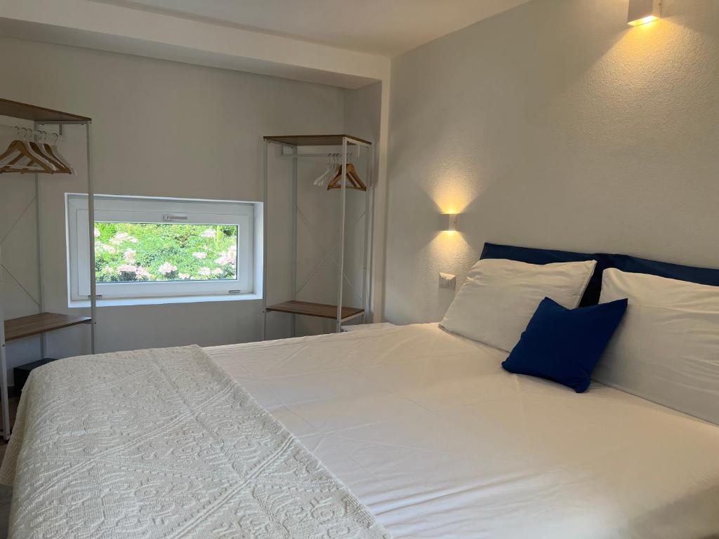 Postel nebo postele na pokoji v ubytování Via Giardini Rooms