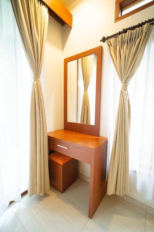 Fotografie z fotogalerie ubytování Adipana Bungalow-Balinese Room v Ubudu