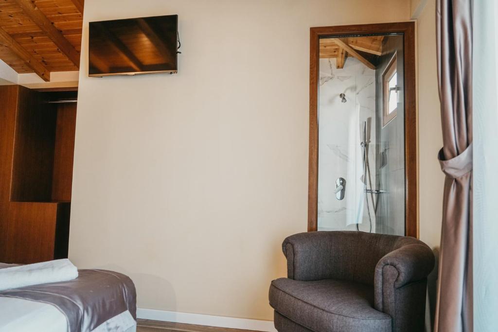 Postel nebo postele na pokoji v ubytování Center Hotel