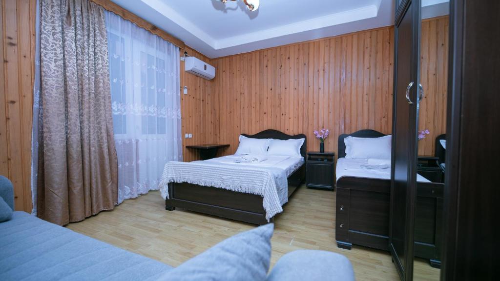 Postel nebo postele na pokoji v ubytování Дом отдыха ира