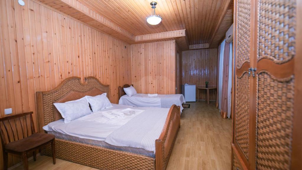 Postel nebo postele na pokoji v ubytování Дом отдыха ира