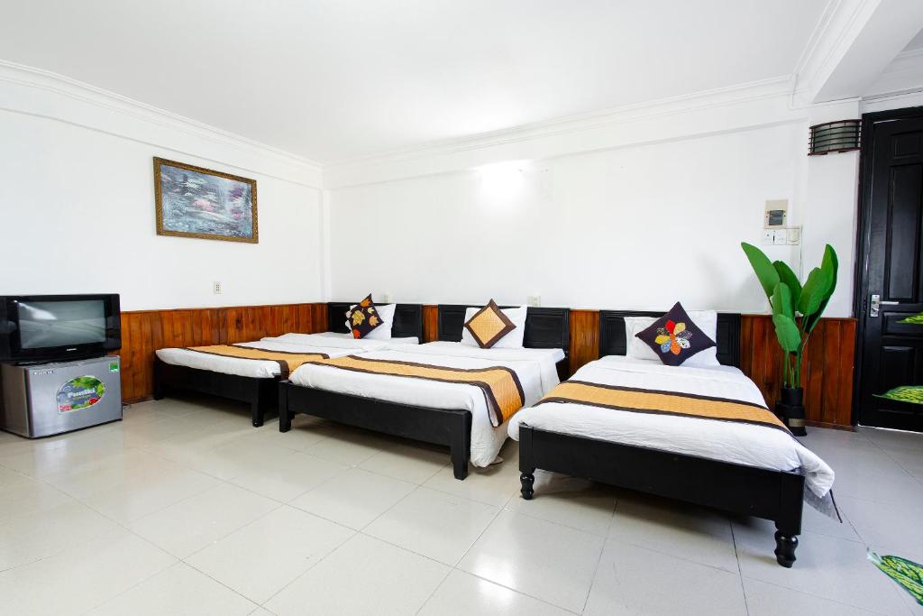 Postel nebo postele na pokoji v ubytování Casablanca Hotel