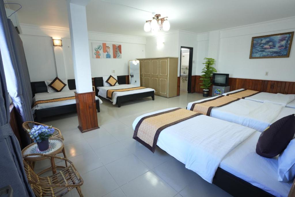 Postel nebo postele na pokoji v ubytování Casablanca Hotel