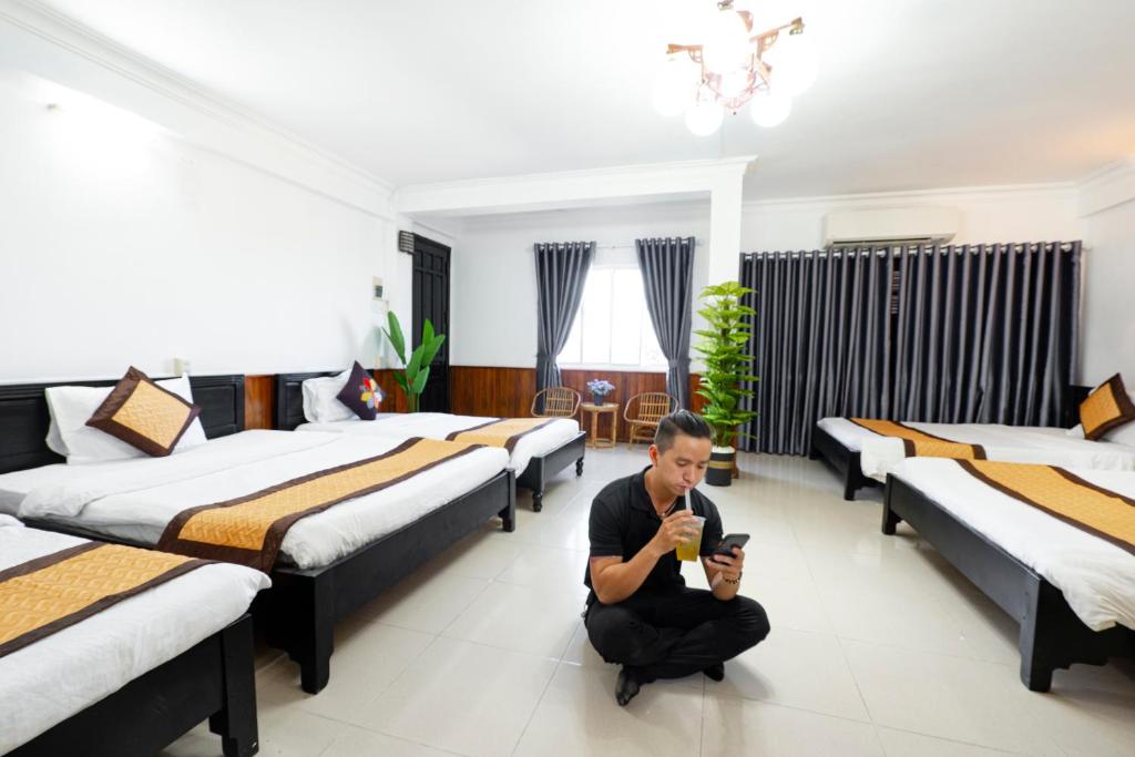 Postel nebo postele na pokoji v ubytování Casablanca Hotel