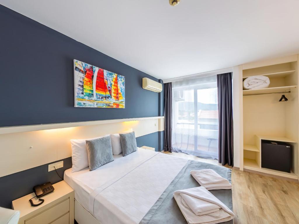 Postel nebo postele na pokoji v ubytování Z OTEL