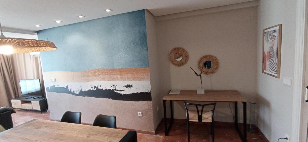 Posedenie v ubytovaní Apartamento Alteanos, centrico y confortable, soleado, con piscina y jardines, tenis, parking exterior comunitario, y la playa andando 10 min