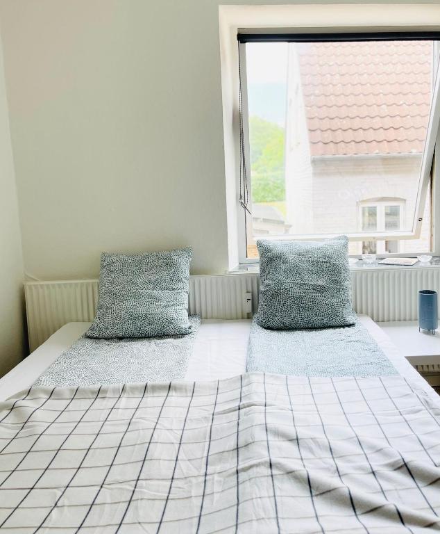 Postel nebo postele na pokoji v ubytování Scandinavian Apartment Hotel -Lunden 2- Central 2 room apartment