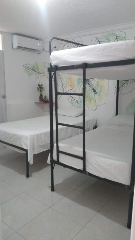 Postel nebo postele na pokoji v ubytování Hotel Casa La Pilonera
