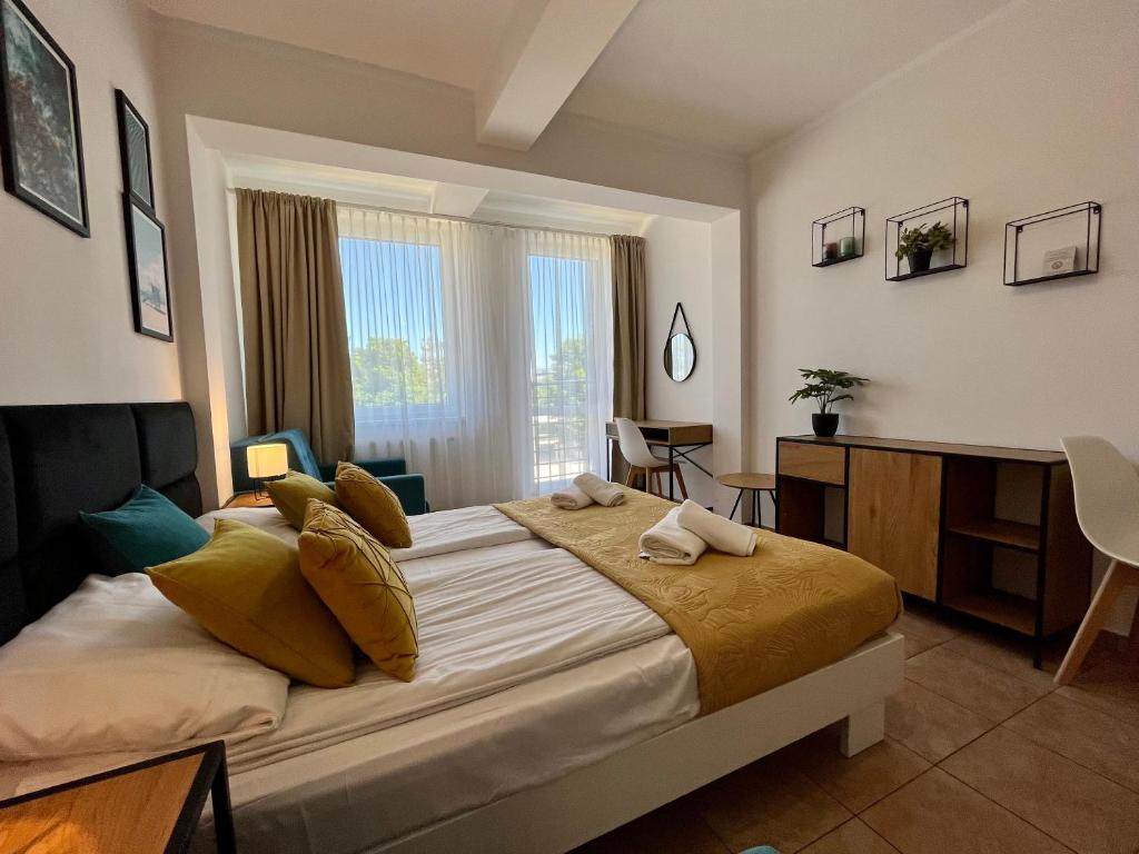 Posteľ alebo postele v izbe v ubytovaní Apartamenty Planeta Mielno 100 m od plaży