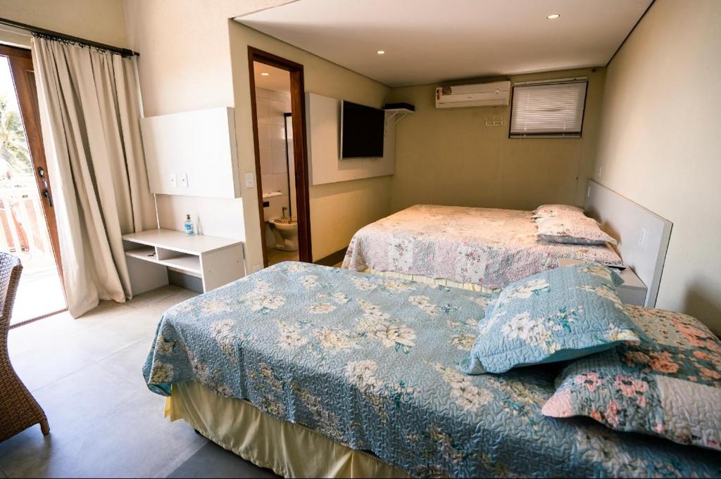 Voodi või voodid majutusasutuse Horizonte Azul Noronha toas
