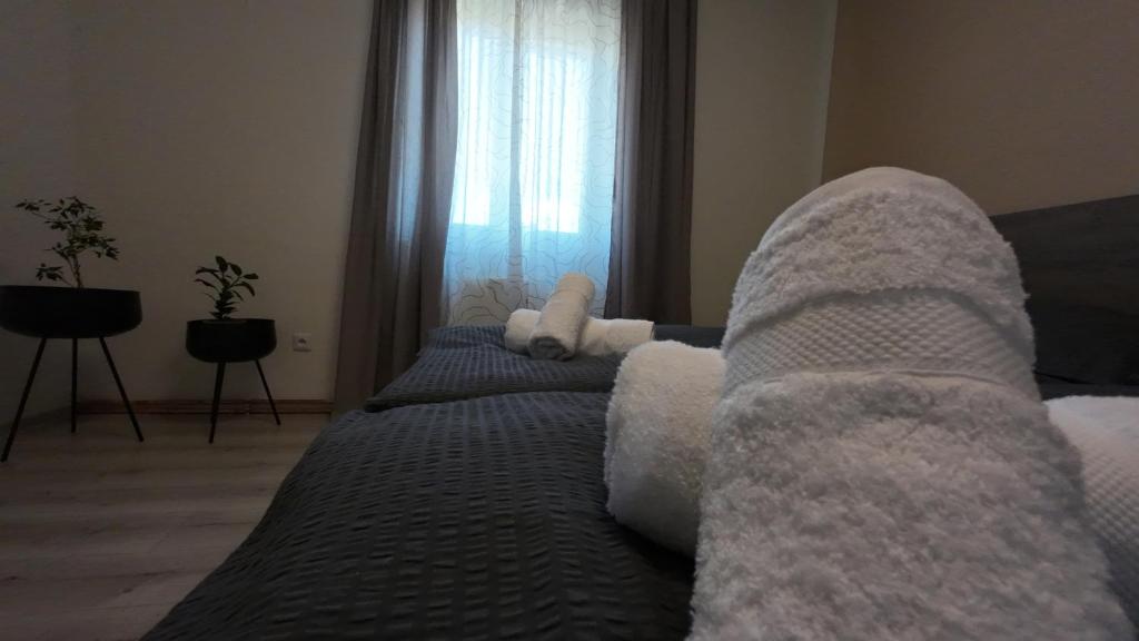 Postel nebo postele na pokoji v ubytování Apartmán Andrea