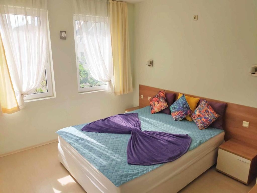 A bed or beds in a room at Sunset Dream Polo Resort