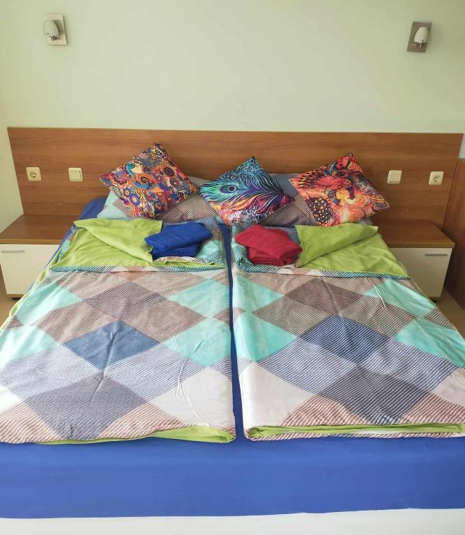 A bed or beds in a room at Sunset Dream Polo Resort