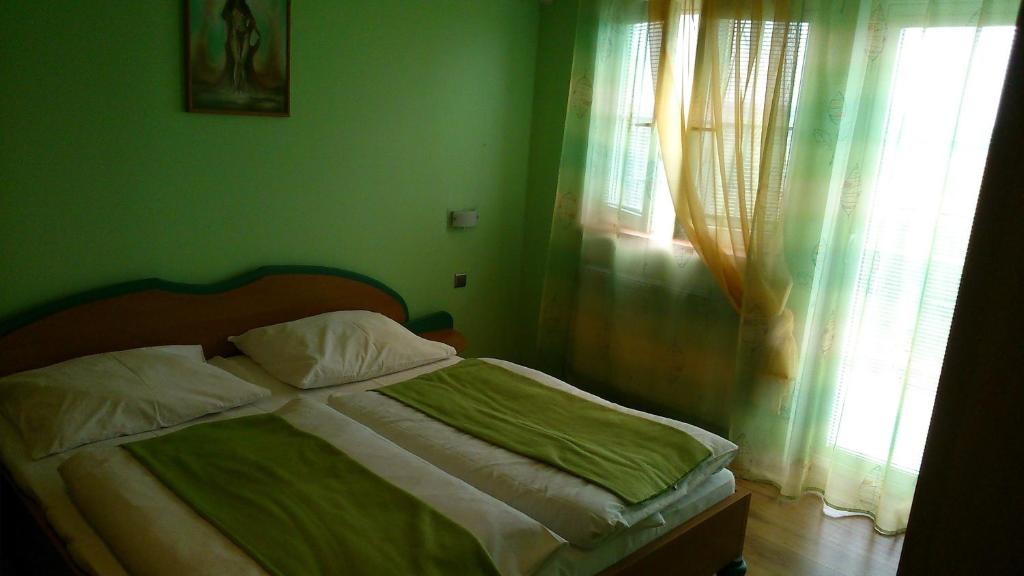 Postel nebo postele na pokoji v ubytování Penzión Rekrea