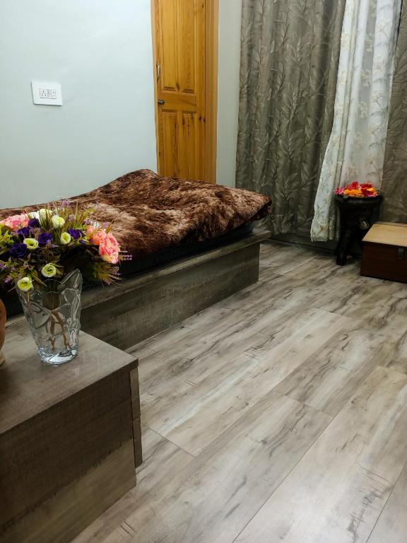 Postel nebo postele na pokoji v ubytování RocRidge Home stay