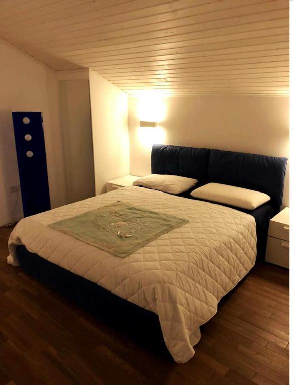 Postel nebo postele na pokoji v ubytování Casa in centro a Lussinpiccolo