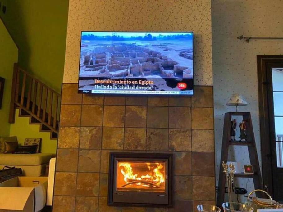 TV a/nebo společenská místnost v ubytování Un encanto de dúplex