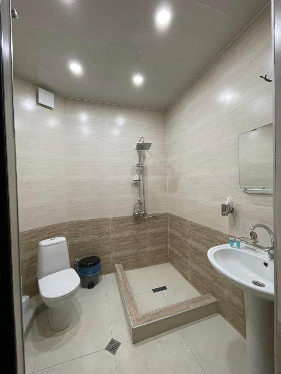 Koupelna v ubytování Hotel Shina