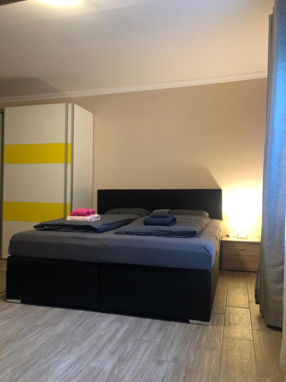 Postel nebo postele na pokoji v ubytování AlpenKlub Hotel