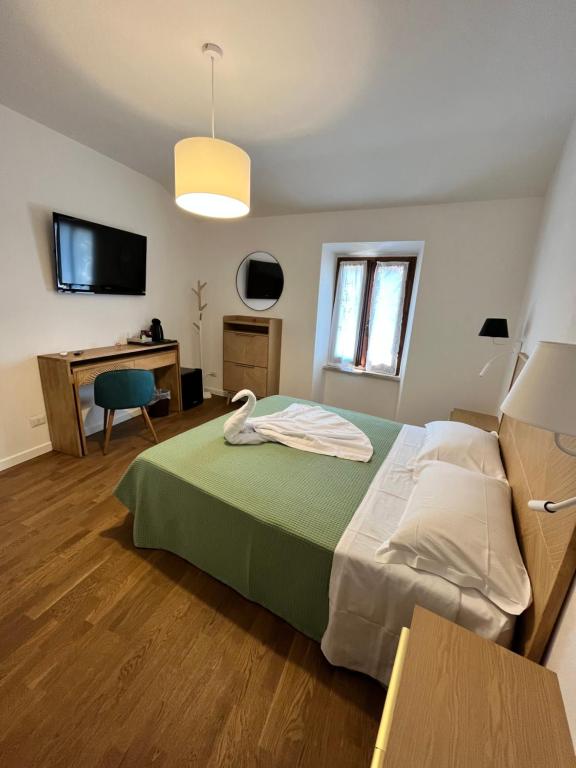 Postel nebo postele na pokoji v ubytování CIVICO 27 rooms