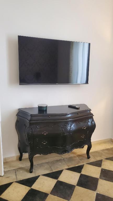 TV a/nebo společenská místnost v ubytování Domus Mia